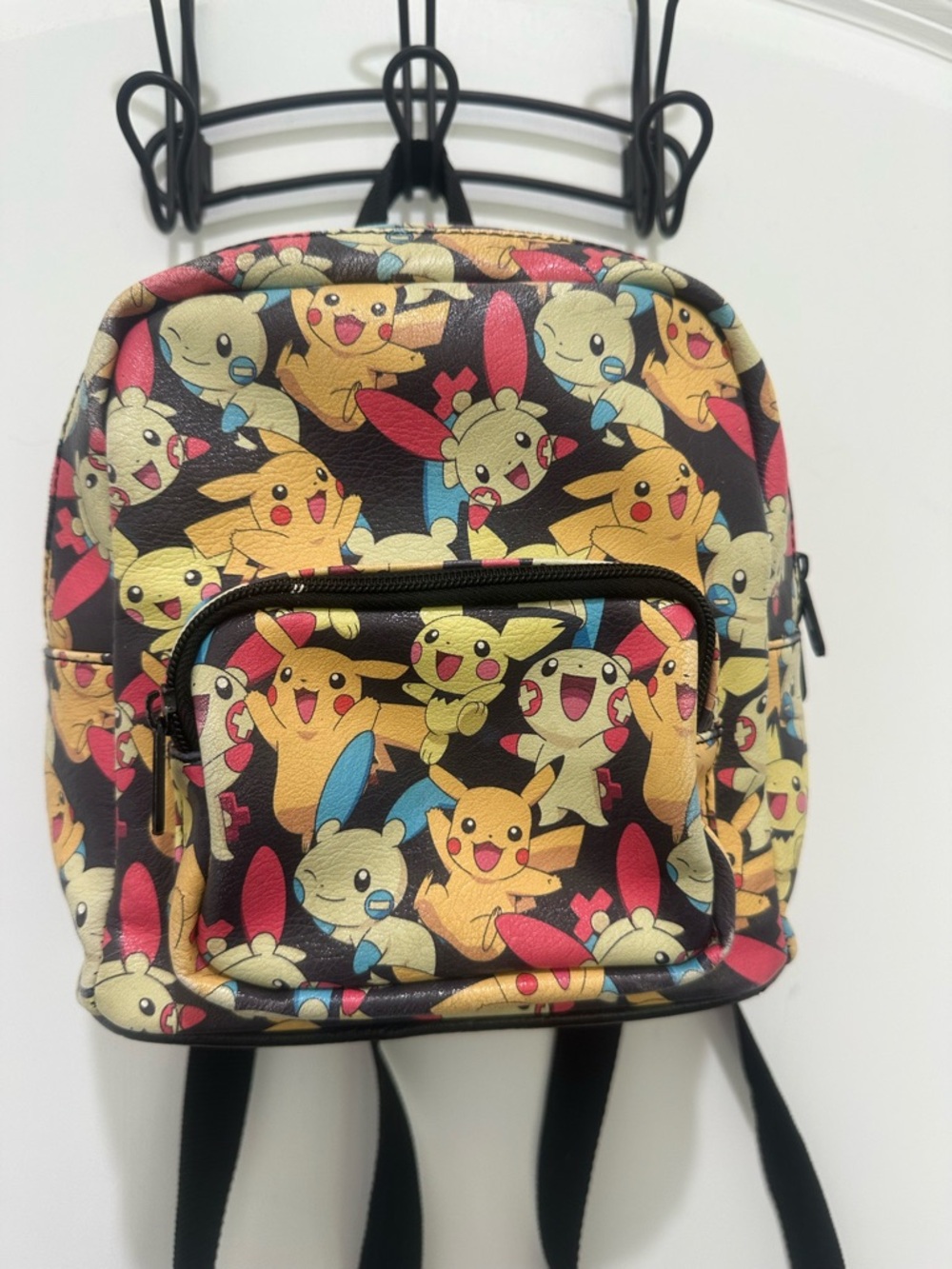 Loungefly Pokémon Mini Backpack faux leather features all over print w/ pikachu